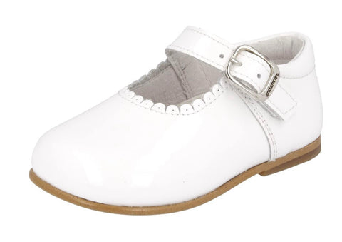 Andanines white patent Mary Janes